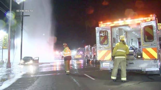 Firefighters Assist Occupant of Vehicle After Collision into Fire Hydrant