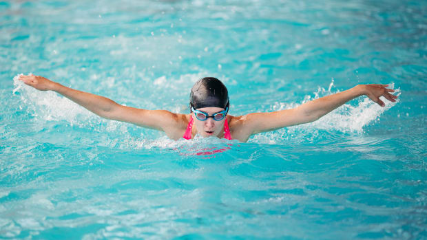young-girl-swimming-butterfly-stroke-style-in-the-2021-09-03-06-34-39-utc