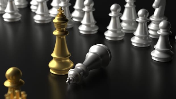 chess-king-gold-standing-winner-on-black-backgroun-2022-12-16-12-25-47-utc