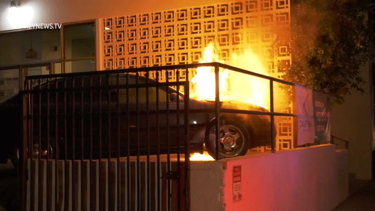 Westlake Vehicle Fire Burns Near Building 