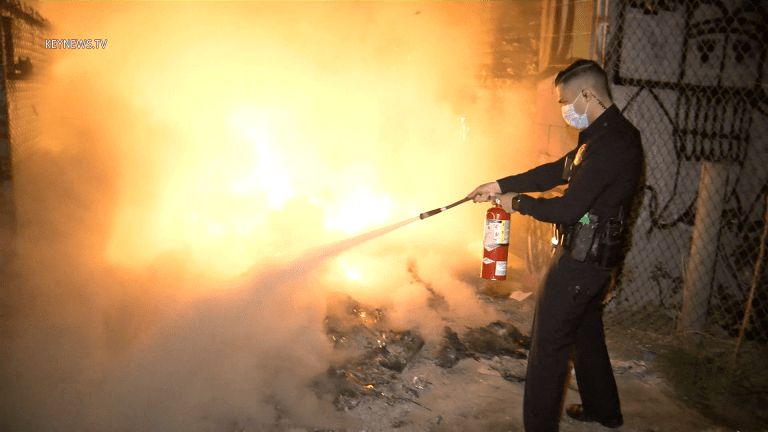 LAPD Attempts to Extinguish Rubbish Fire
