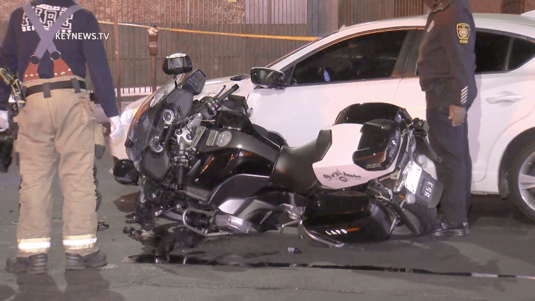 Los Angeles Police Department Motor Officer Struck by Vehicle Exiting Stop Sign
