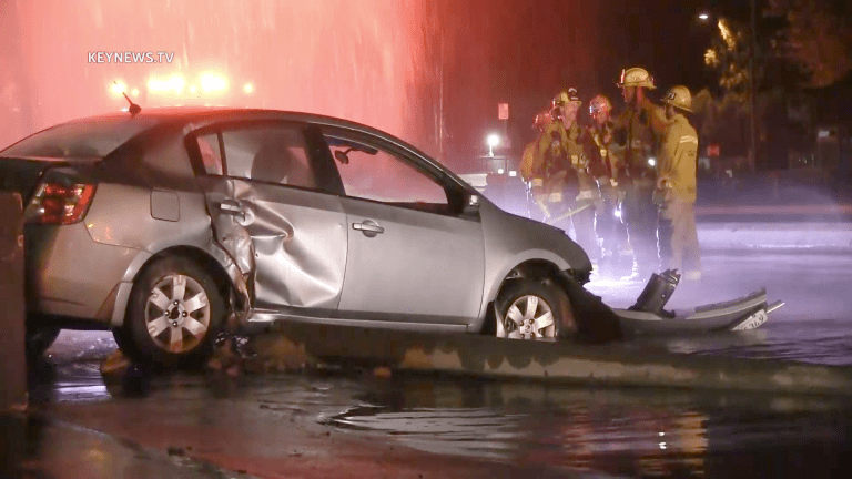Single Vehicle Crash Damages Pole, Hydrant and Block Wall Before Coming to a Stop