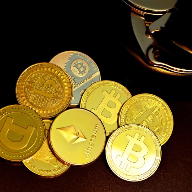 various crypto coins in a pile
