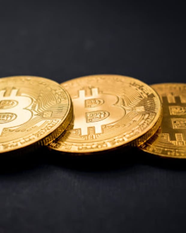Three gold bitcoins