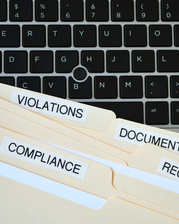 file-folders-with-words-compliance-violations-do-2022-11-14-04-25-05-utc
