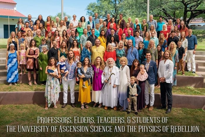 Gabriel (front row, white robes and walking stick) with his "cosmic family"