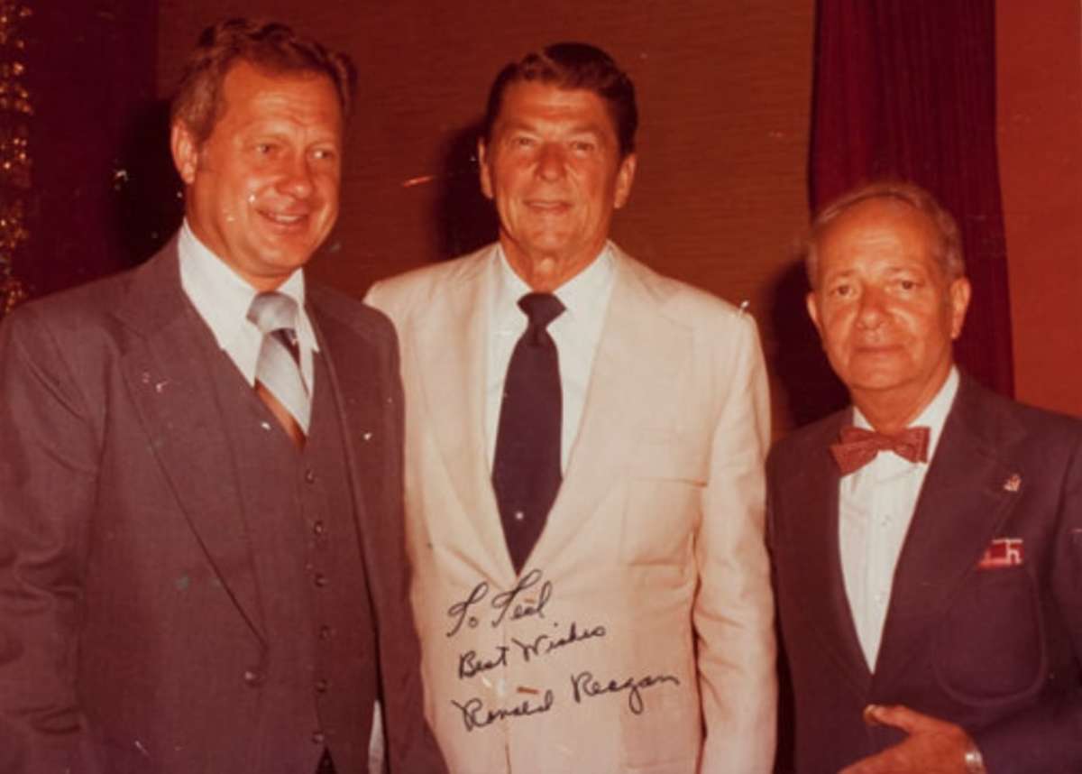 left to right: Ted Gunderson, Ronald Reagan, and someone in a bow tie