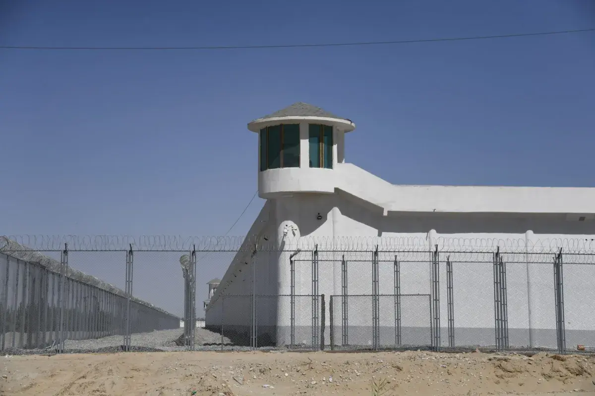 This file photo taken on May 31, 2019, shows a watchtower on a high-security facility near what is believed to be a re-education camp where mostly Muslim ethnic minorities are detained, on the outskirts of Hotan, in China's northwestern Xinjiang region. Photo: AFP / Greg Baker